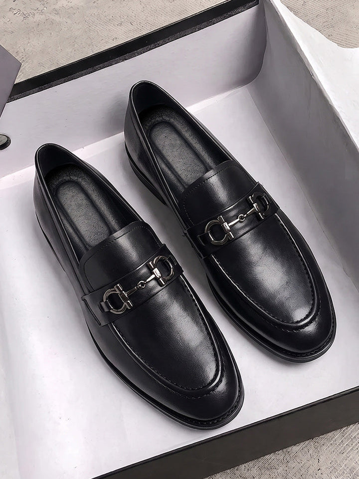Detailed view of men's horsebit loafers in top grain leather