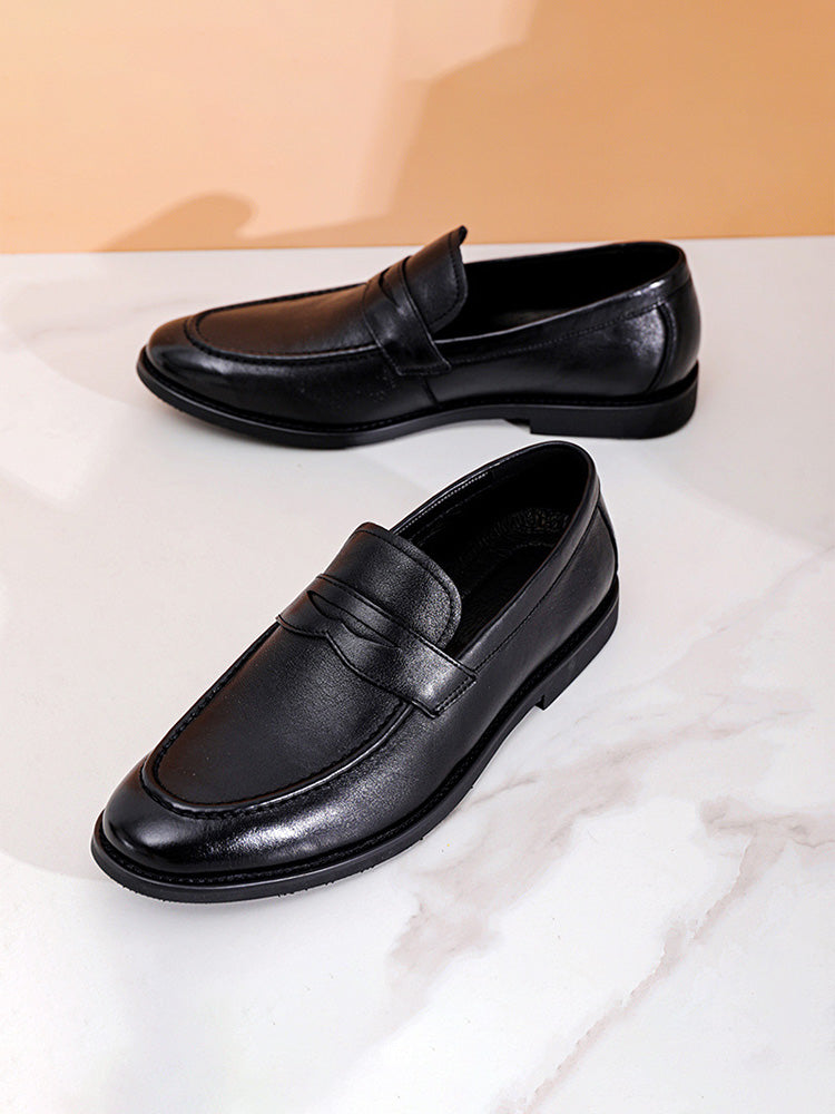 Men's slip-on leather penny loafers with traditional saddle strap detail