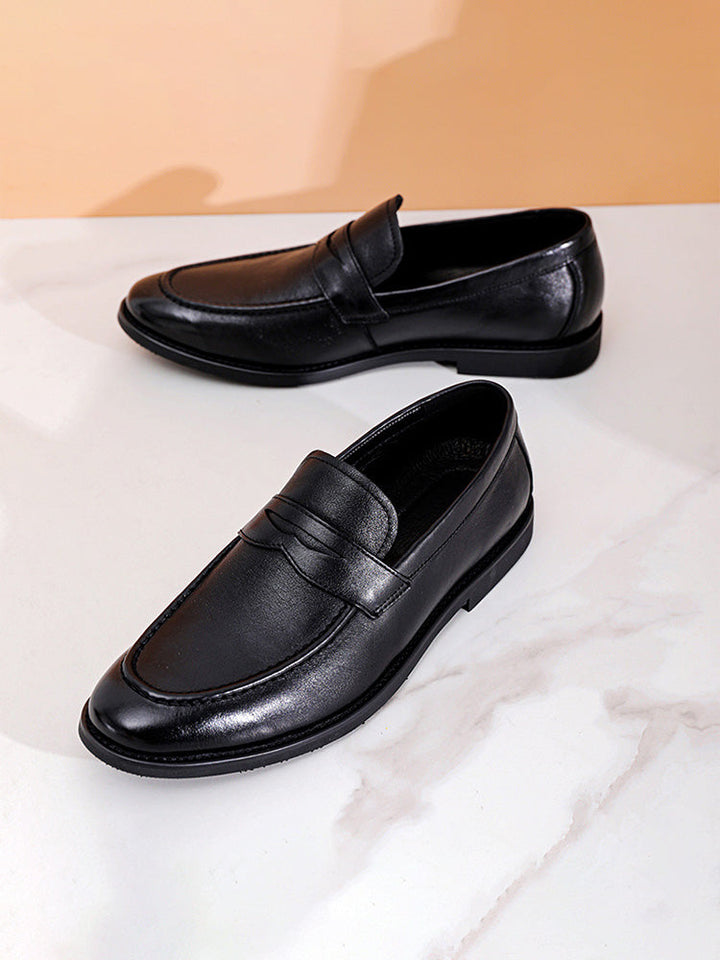 Men's slip-on leather penny loafers with traditional saddle strap detail