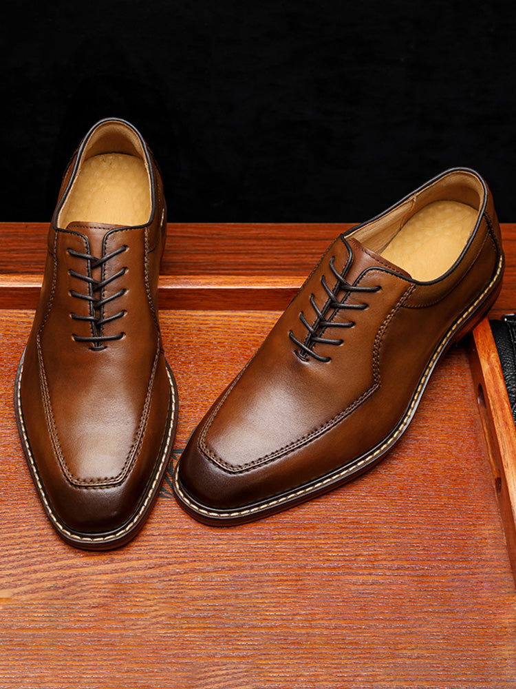 Rear view of men's leather derby shoes with clean formal silhouette