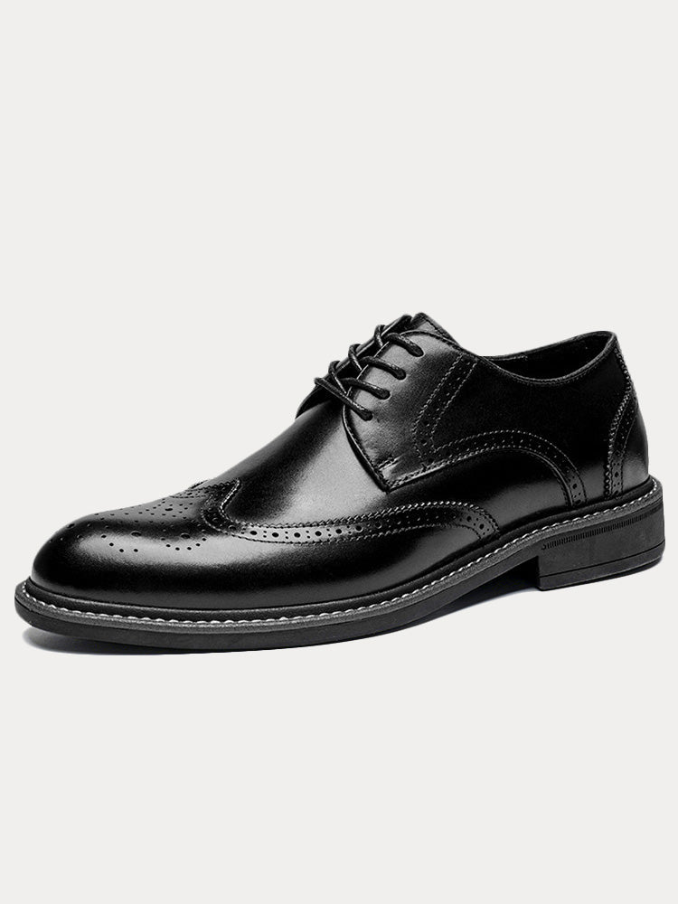 Pair of men's leather brogue derby shoes with classic perforated detailing