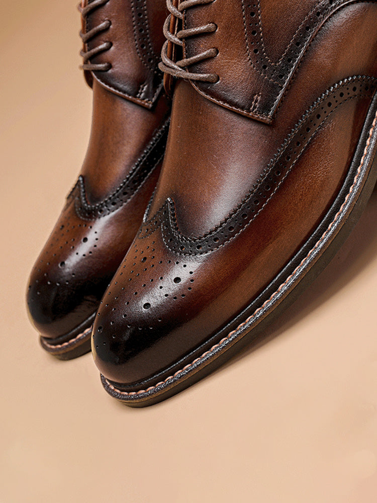 Rear view of men's leather brogue derby shoes showing heel detail