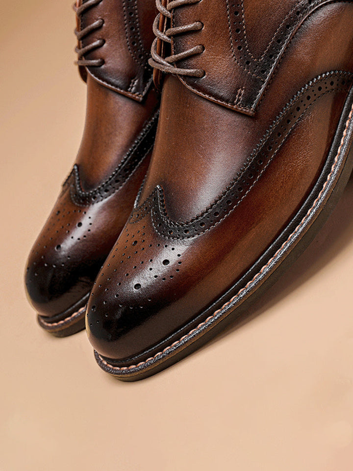 Rear view of men's leather brogue derby shoes showing heel detail