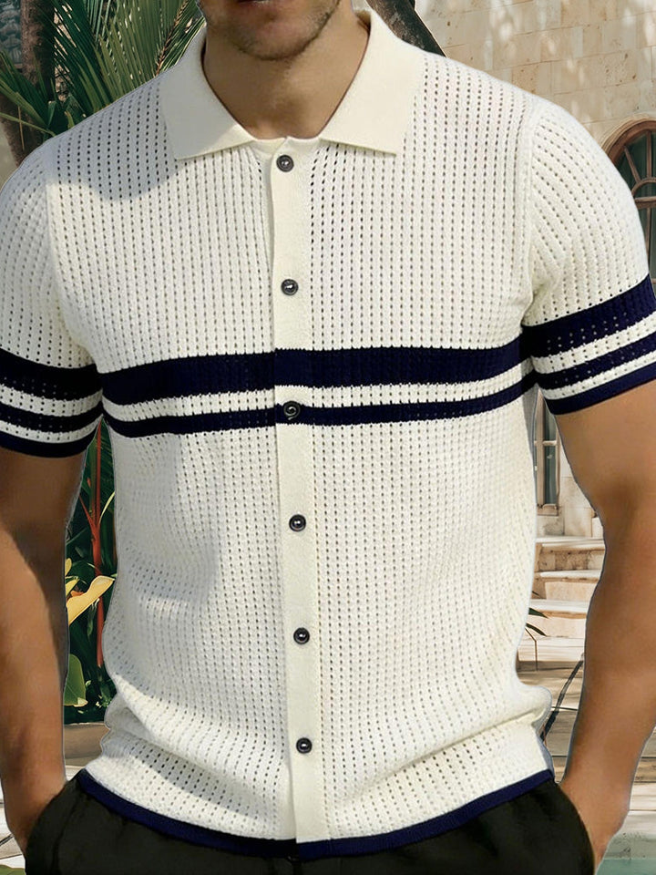 Close-up of the open-knit texture and stripe detail on the cream polo shirt