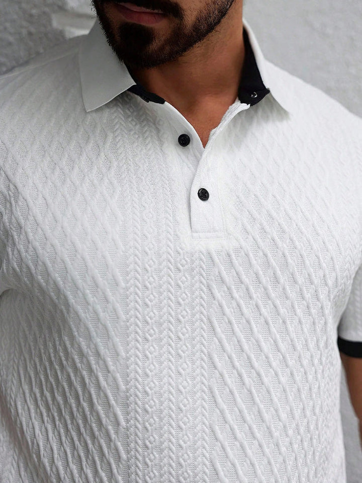 Folded men's white jacquard knit polo shirt showing collar detail
