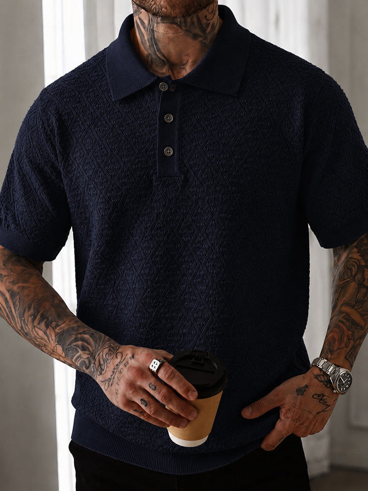 Close-up of pointelle knit texture on men's short sleeve polo shirt