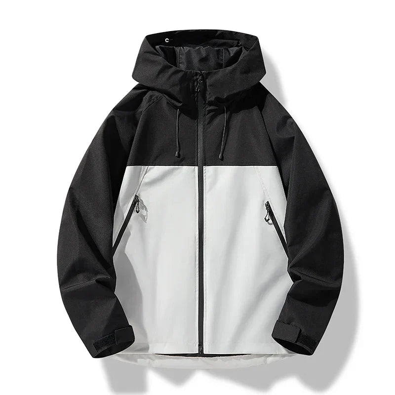 Side view of a lightweight unisex outdoor jacket with hood