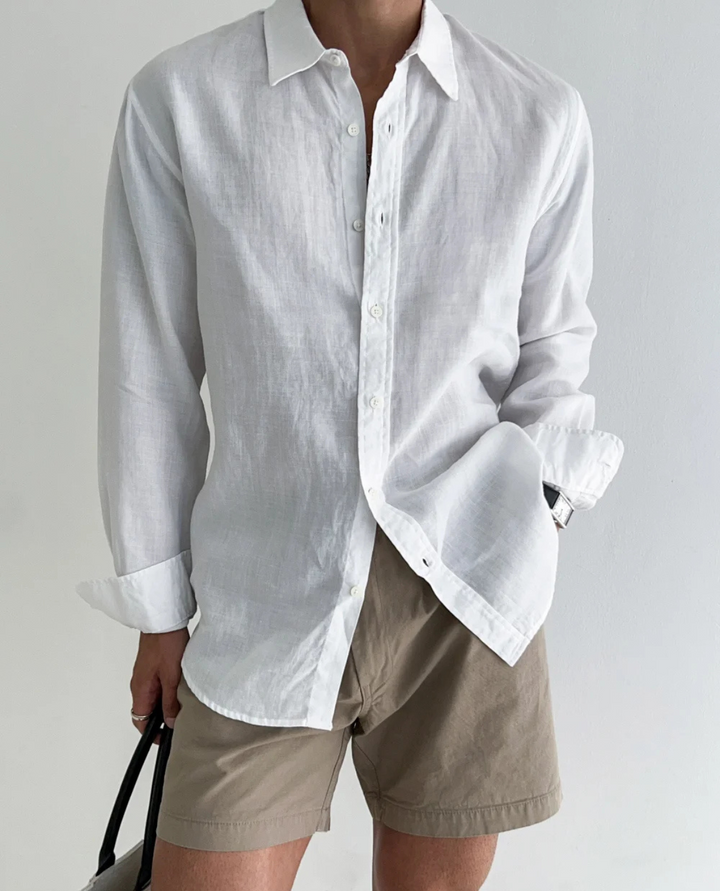Close-up of men's linen short sleeve shirt fabric and buttons