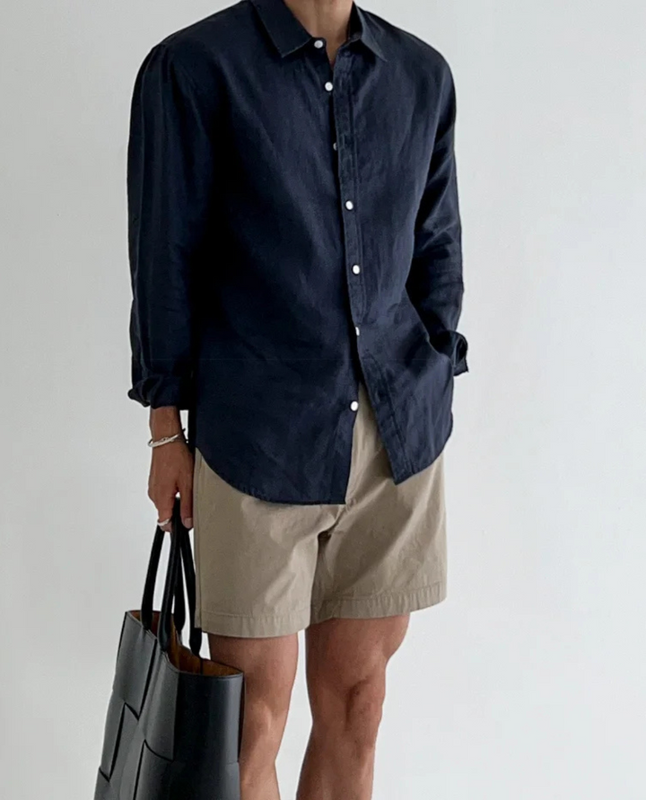 Men's summer linen shirt with short sleeves on a plain background