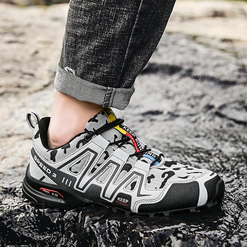 Men's slip-resistant hiking trainers angled to show tread and upper detail