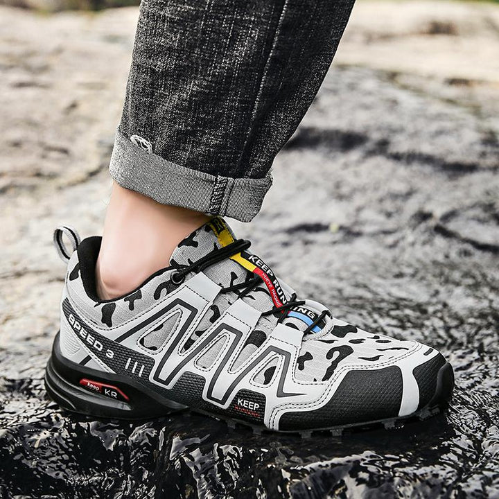 Men's slip-resistant hiking trainers angled to show tread and upper detail
