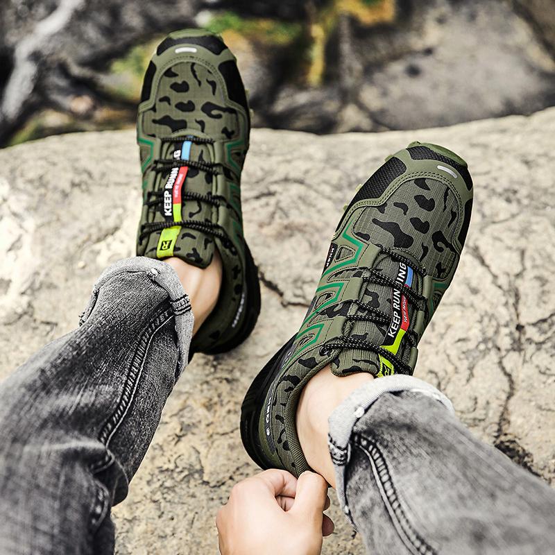 Close-up of the sole on men's hiking trainers with slip-resistant grip pattern