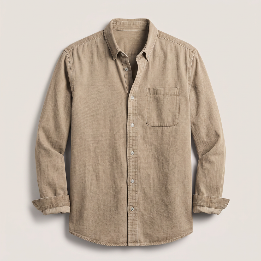 Men's denim shirt displayed with its button fastening