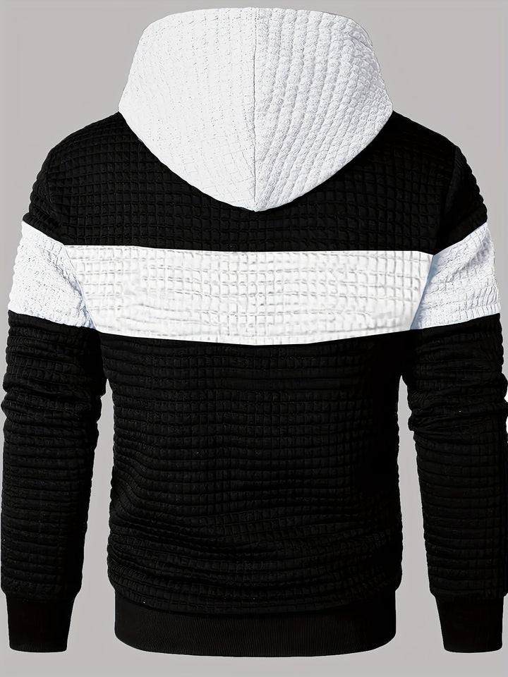 Men's textured gradient hoodie shown as a versatile layering piece
