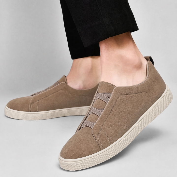 Front view of men's suede sneakers with rounded toes