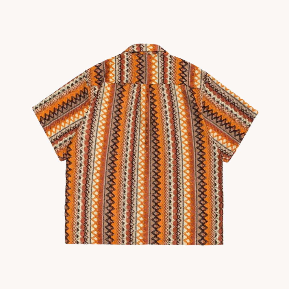 Front view of men's camp collar geometric stripe shirt