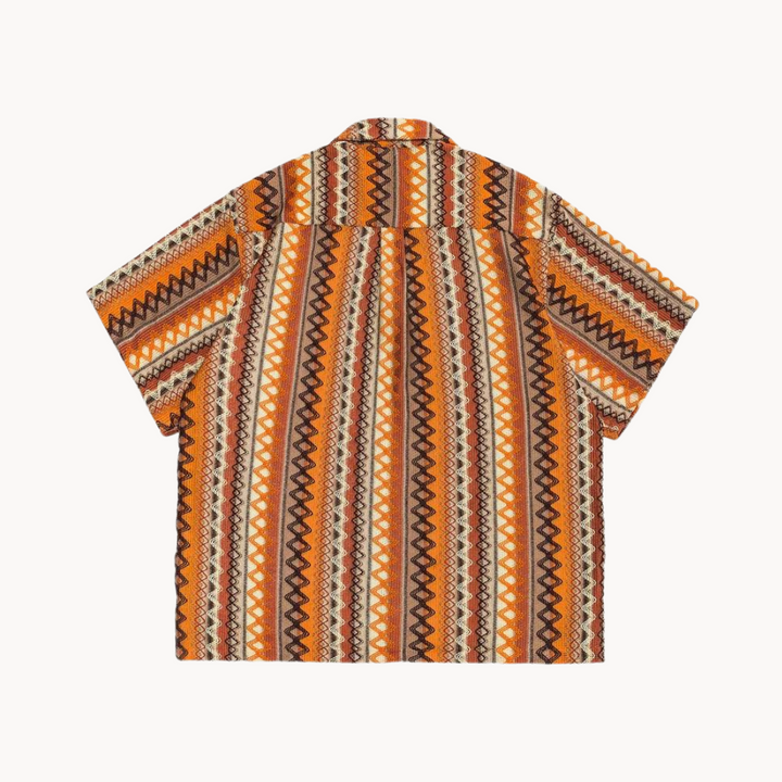 Front view of men's camp collar geometric stripe shirt