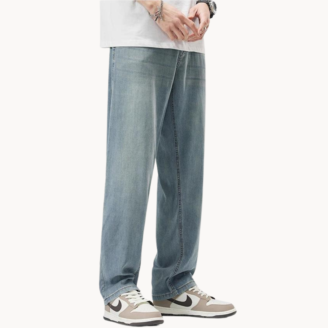 Men's straight-leg lyocell blend trousers styled on a model