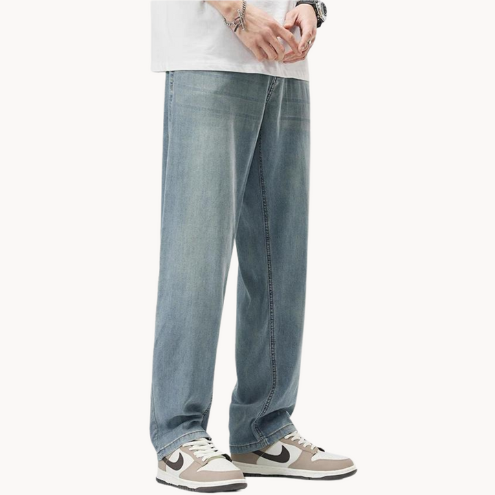 Men's straight-leg lyocell blend trousers styled on a model