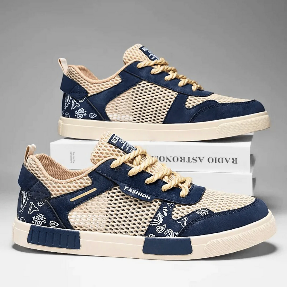 Pair of men's casual mesh trainers with low top design and lace-up closure