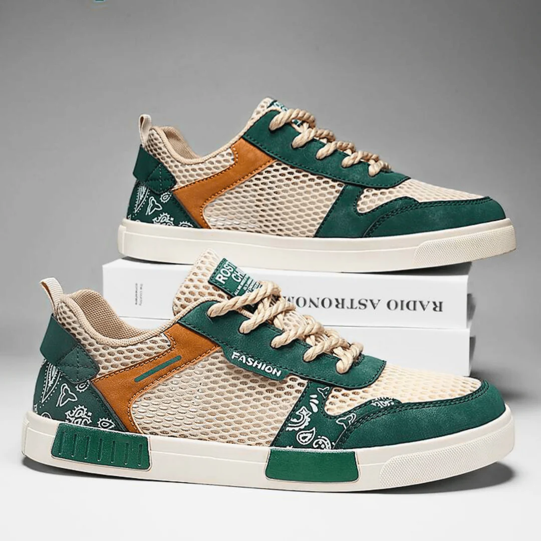 Side profile of men's low top lace-up trainers in mesh for casual everyday wear