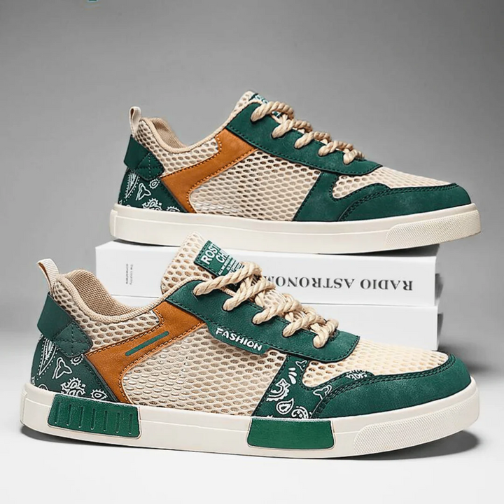 Side profile of men's low top lace-up trainers in mesh for casual everyday wear