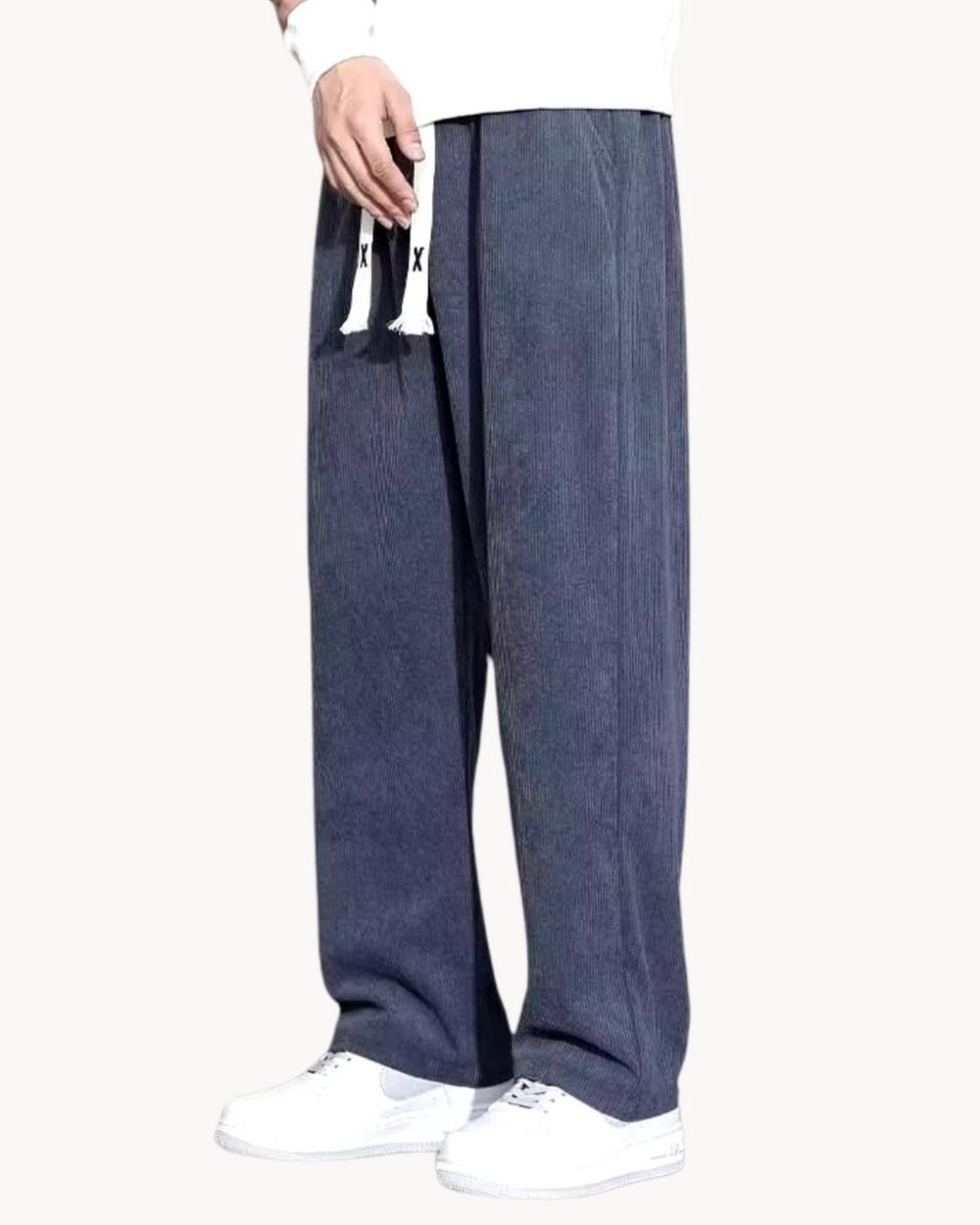 Men's corduroy trousers with straight leg cut, angled front view