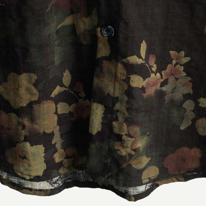 Men's short sleeve floral shirt showing collar and woven fabric texture