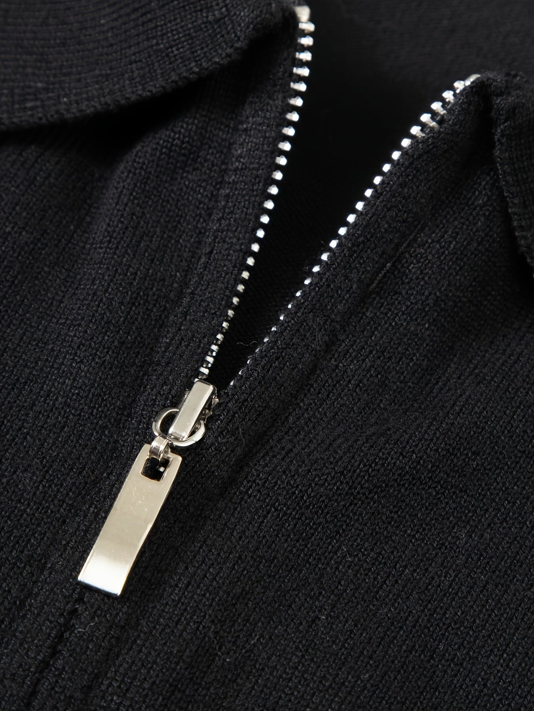 Side view of a men's half zip knitted polo jumper