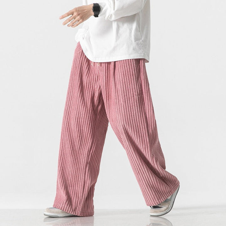 Men's corduroy sweatpants with relaxed tapered fit shown from the front