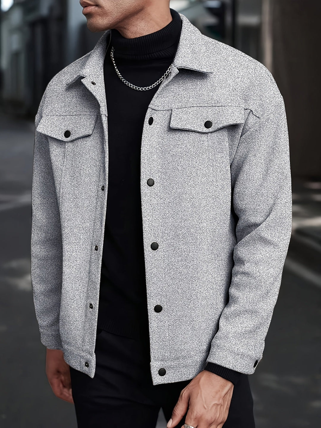 Side view of men's transitional jacket showing its casual shape