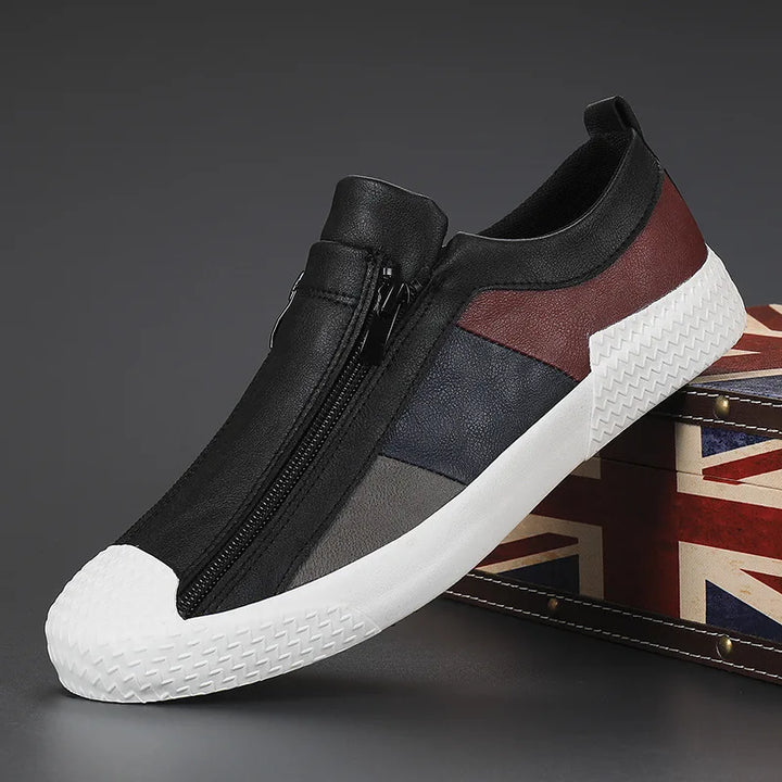 Pair of men's colourblock leather trainers displayed from above