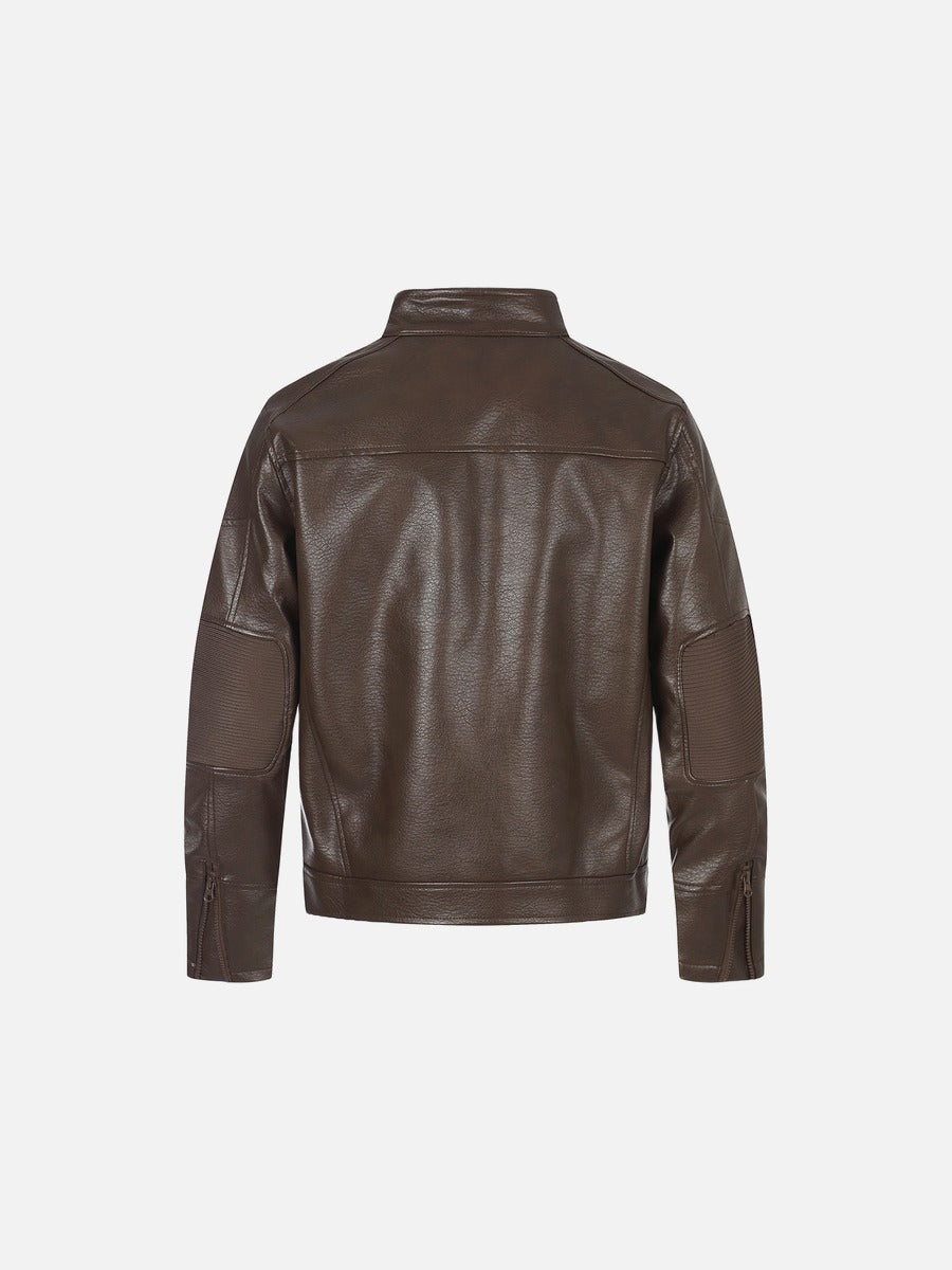 Close-up of the brown faux leather jacket's textured finish