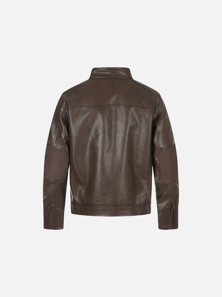 Close-up of the brown faux leather jacket's textured finish