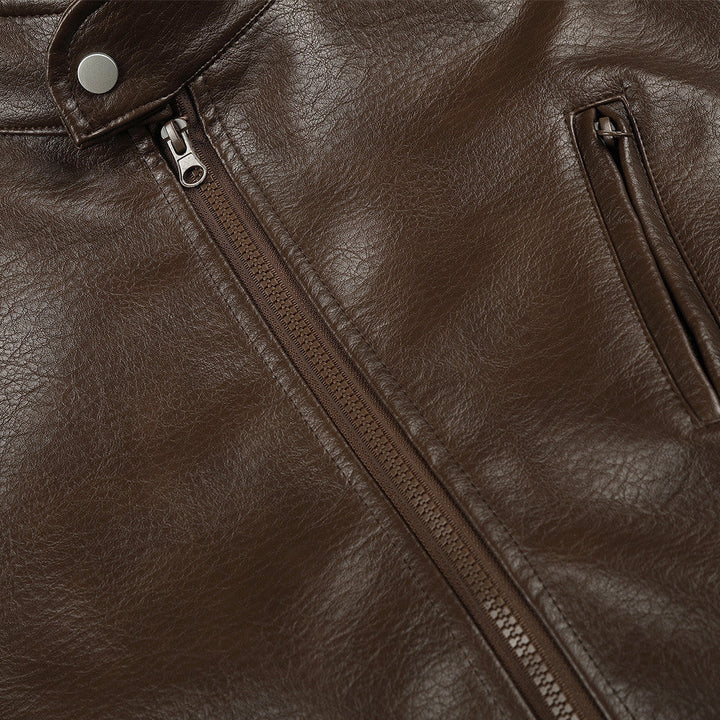 Brown faux leather biker jacket styled with casual clothing