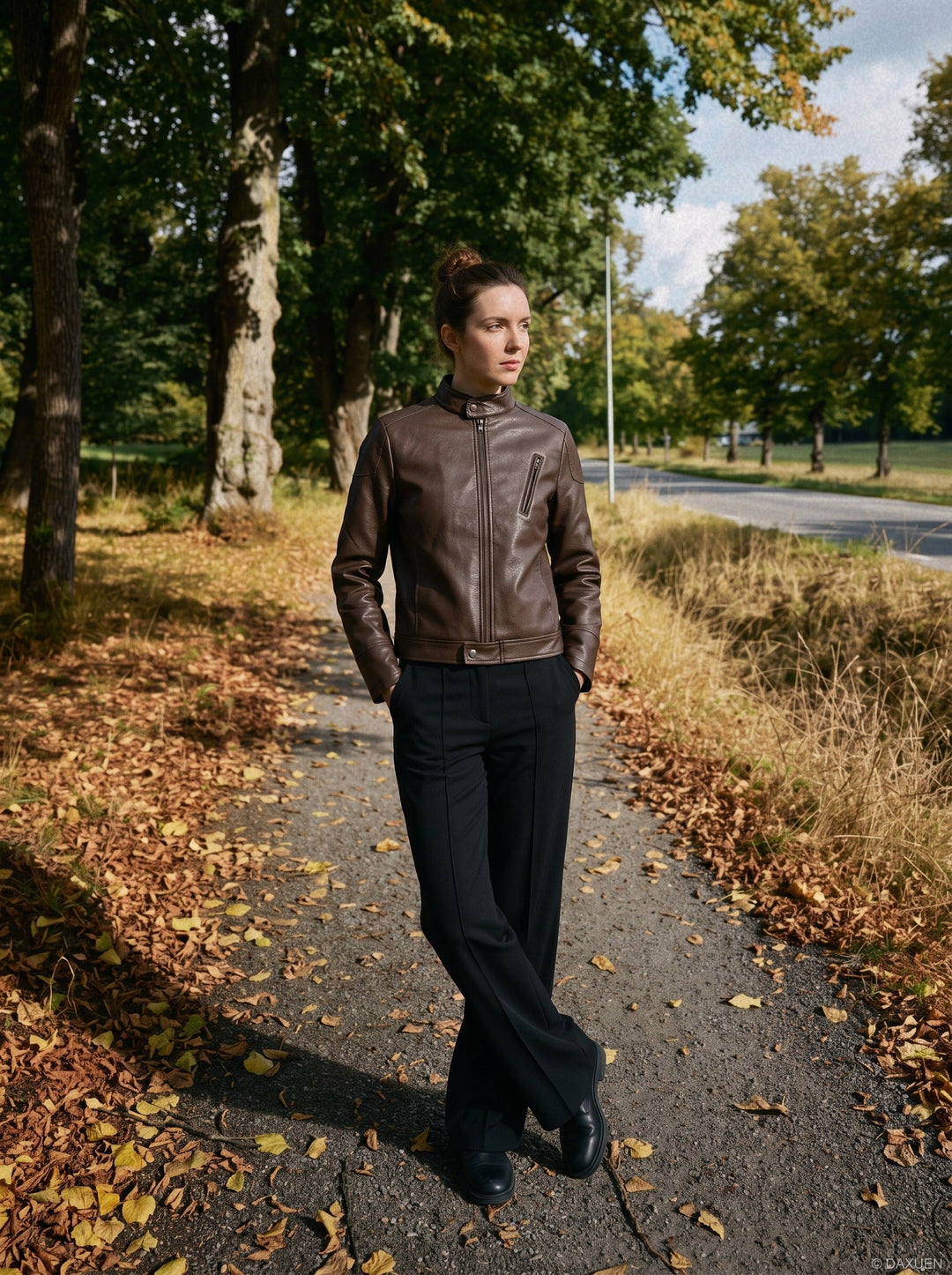 Close-up of the brown faux leather biker jacket collar and lapels