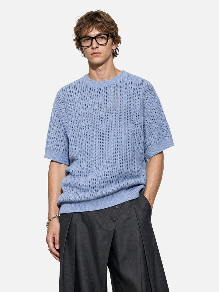 Full-length view of the men's open knit short sleeve top