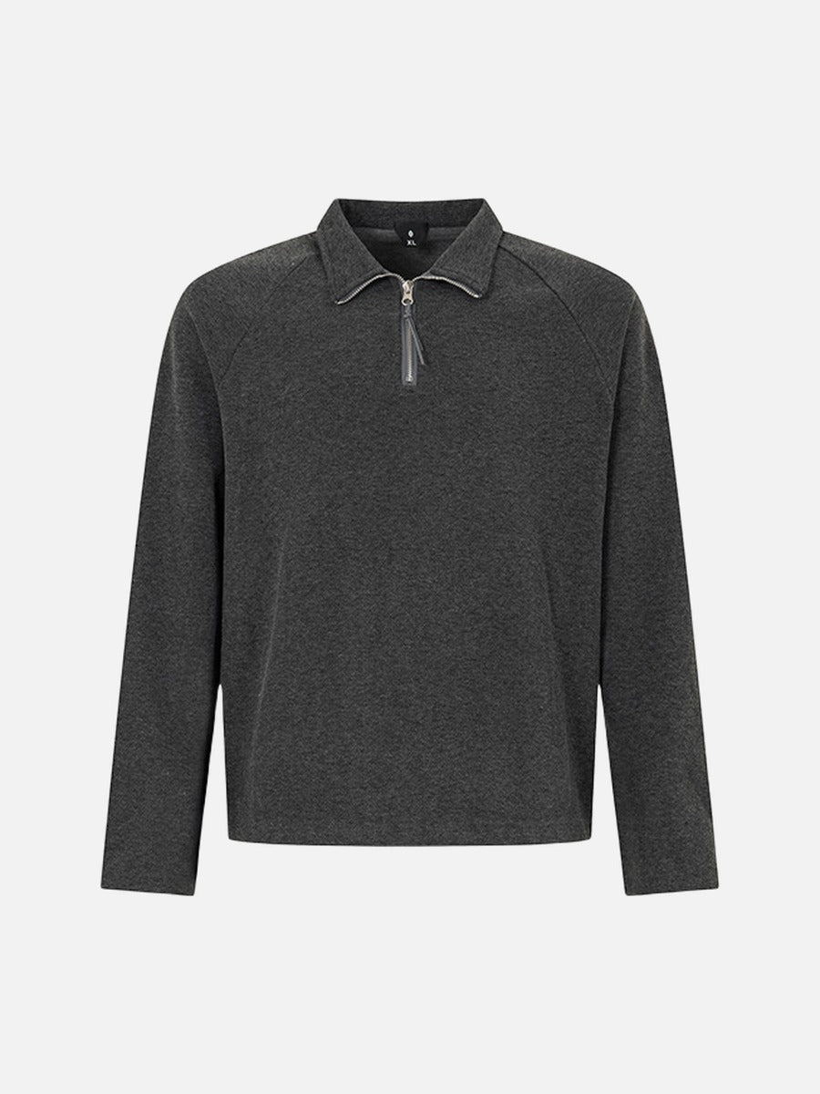 Men's half zip polo long sleeve top shown from the back