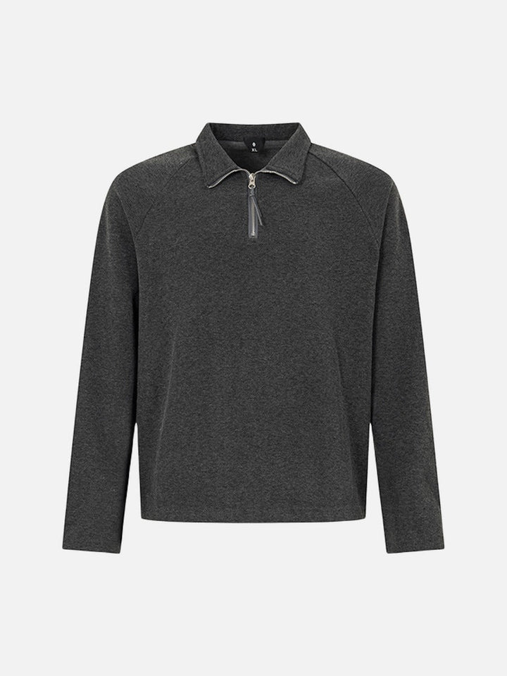 Men's half zip polo long sleeve top shown from the back