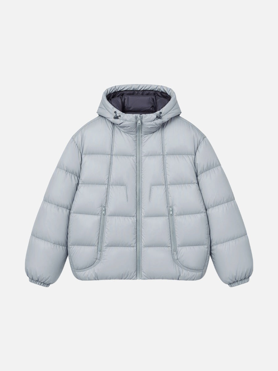 Men's puffer jacket showing the contrast lining and padded construction