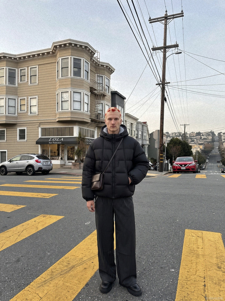 Back view of the men's contrast-lined puffer jacket