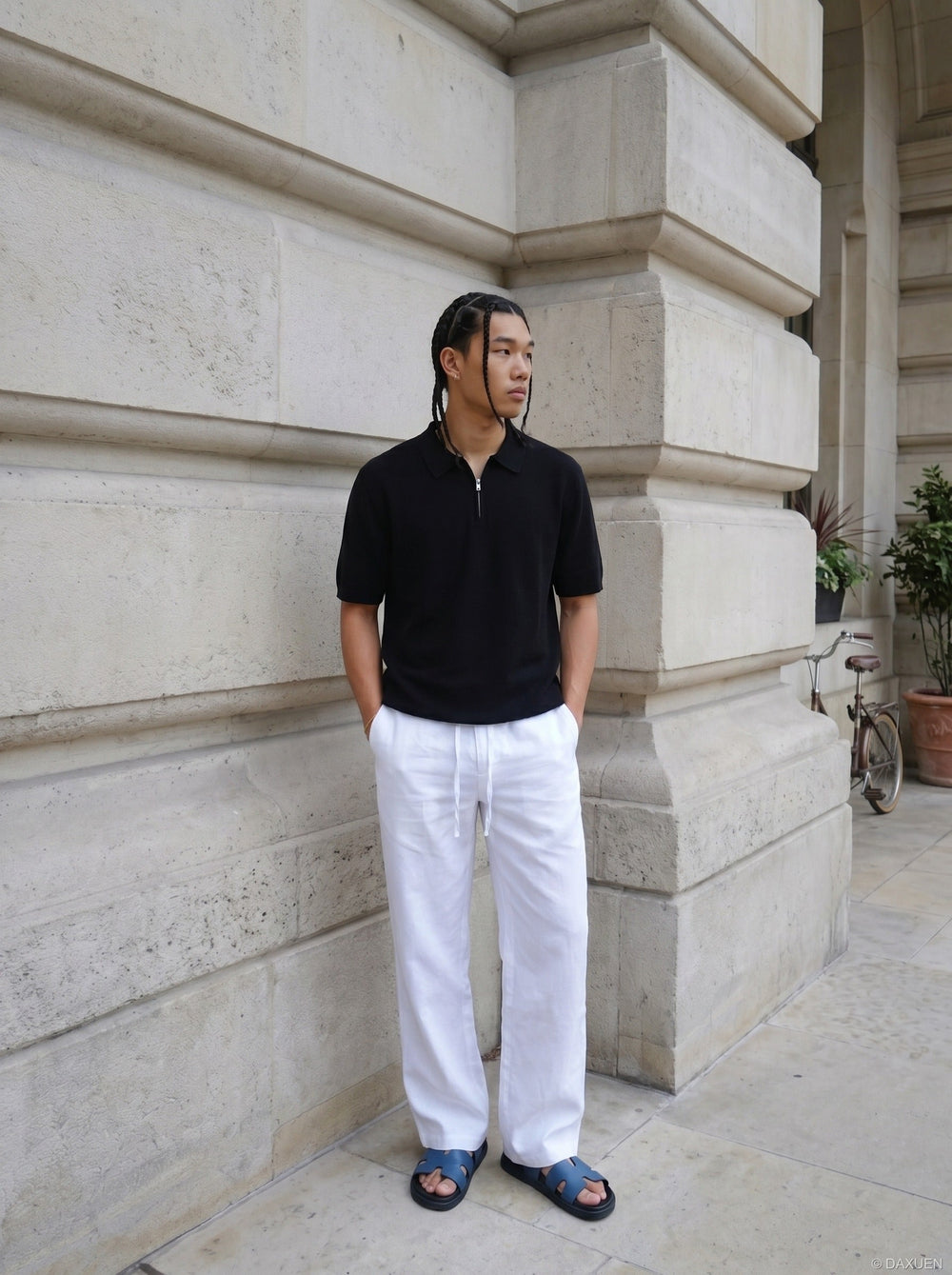 Folded men's diagonal texture knit polo shirt highlighting the zip neck
