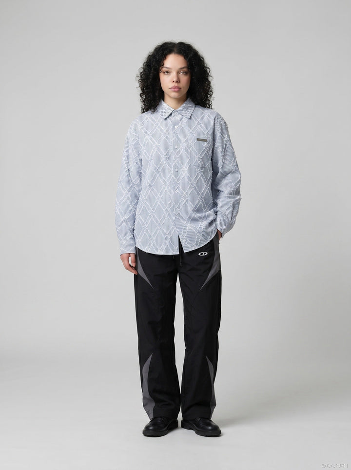 Men's textured pinstripe shirt styled with sleeves down