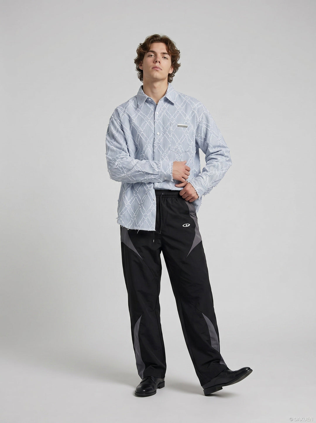 Men's smart-casual distressed pinstripe button-up shirt on model