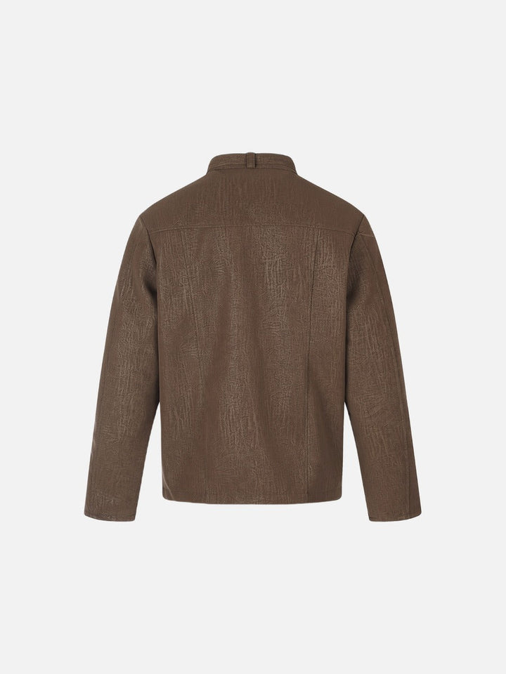 Back view of men's brown distressed boxy jacket