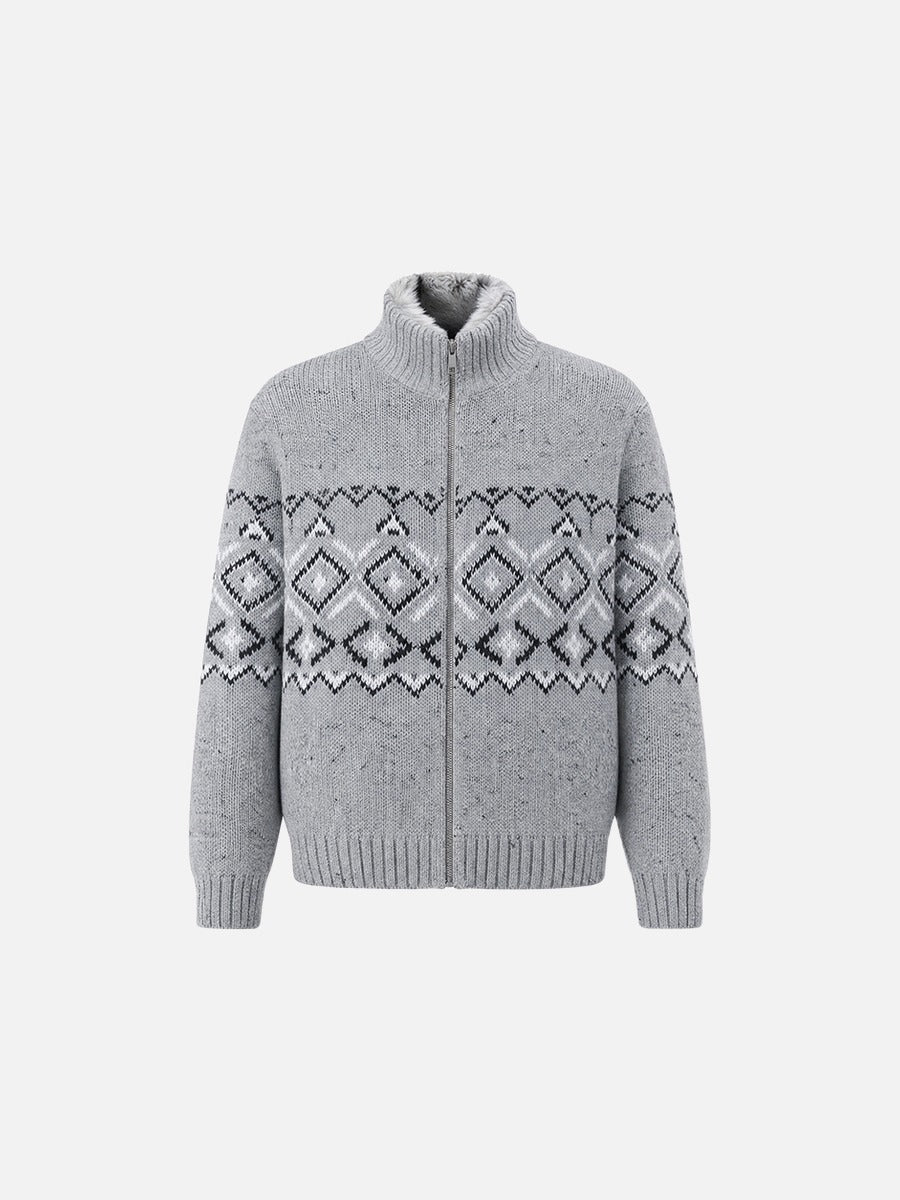 Close-up view of the cardigan's geometric knitted pattern