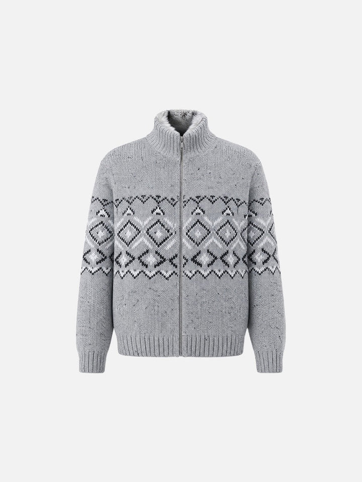 Close-up view of the cardigan's geometric knitted pattern
