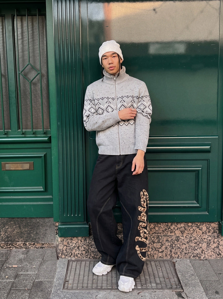 Front view of a men's geometric knit mock neck cardigan
