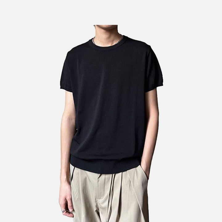 Detail view of crew neck and sleeve on men's ribbed T-shirt