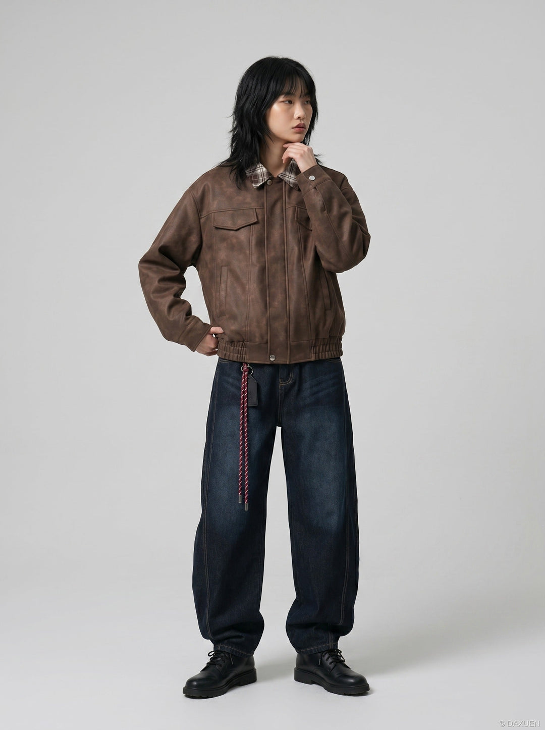 Men's leather bomber jacket styled as smart casual outerwear